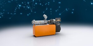 A COMPEO LAB compounder, placed in the BUSS world. The smallest laboratory Co-Kneader, the compounder model for laboratory applications.