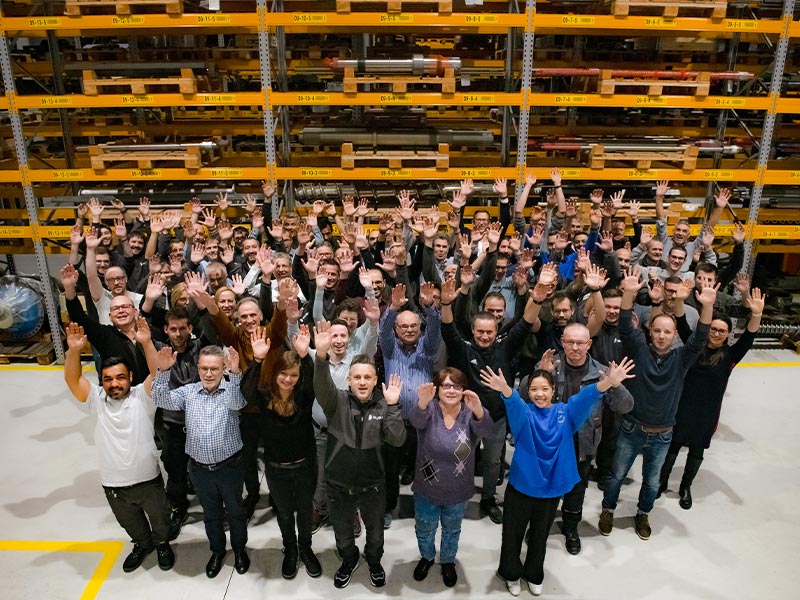 buss_mitarbeiter-in-fertigung_gruppenbild Picture of BUSS employees in the warehouse at BUSS's Swiss headquarters
