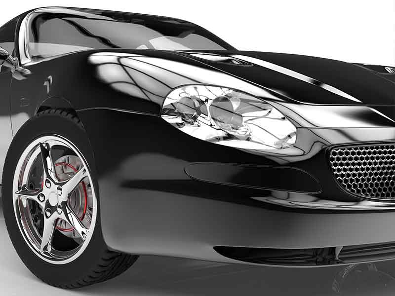 Черный автомобиль в качестве примера армированных волокном синтетических полимеров, изготовленных путем компаундирования армированных волокном термопластов